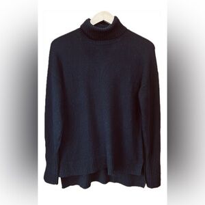J. Crew relaxed wool turtleneck sweater in black
Size small 
Wool blend